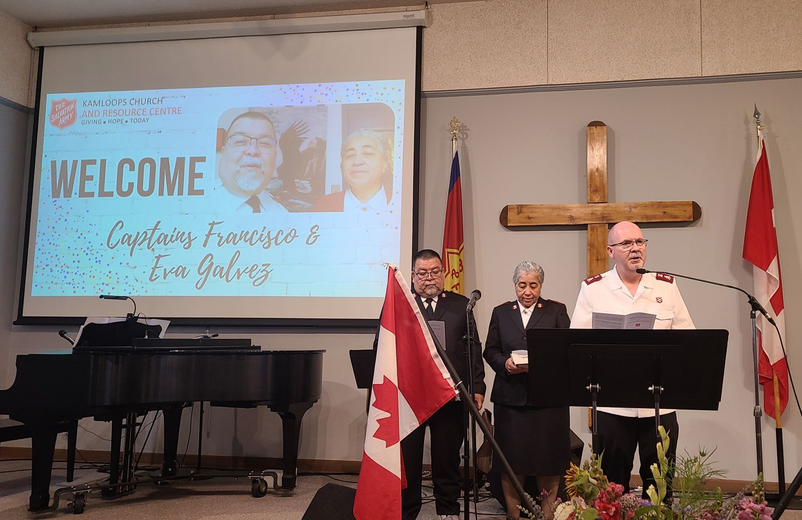 Three adults at a Salvation Army installation
